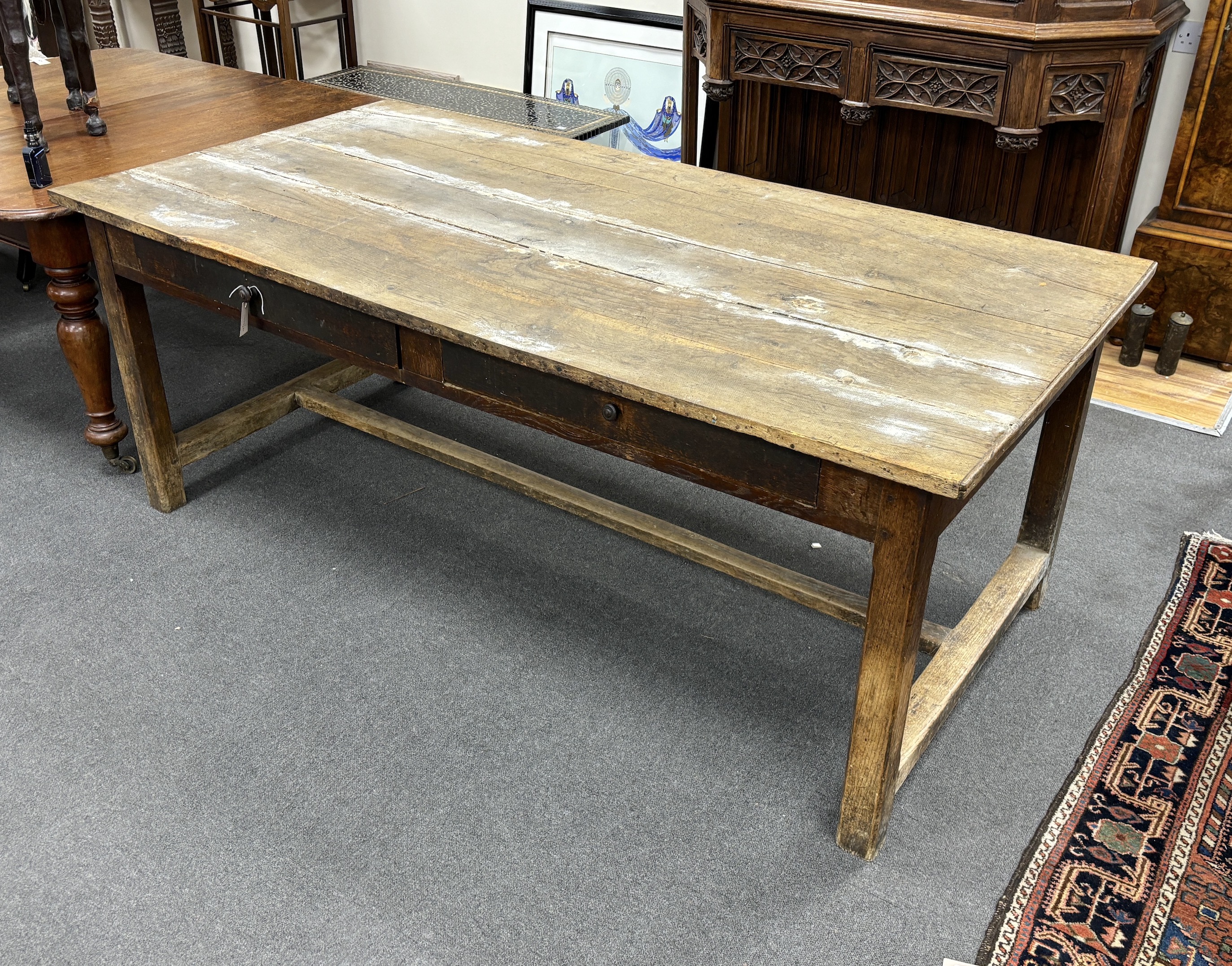 A 19th century French rectangular oak two drawer farmhouse table, length 201cm, depth 101cm, height 78cm